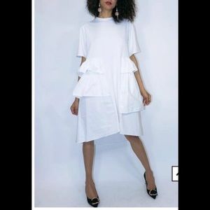 White gorgeous dress with oversize pockets